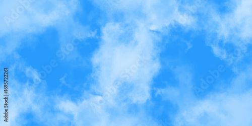 Blue sky with soft white clouds, natural background with fluffy cloudscape and clear atmosphere for peaceful design.