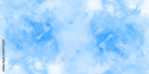Blue sky with soft white clouds, natural background with fluffy cloudscape and clear atmosphere for peaceful design.
