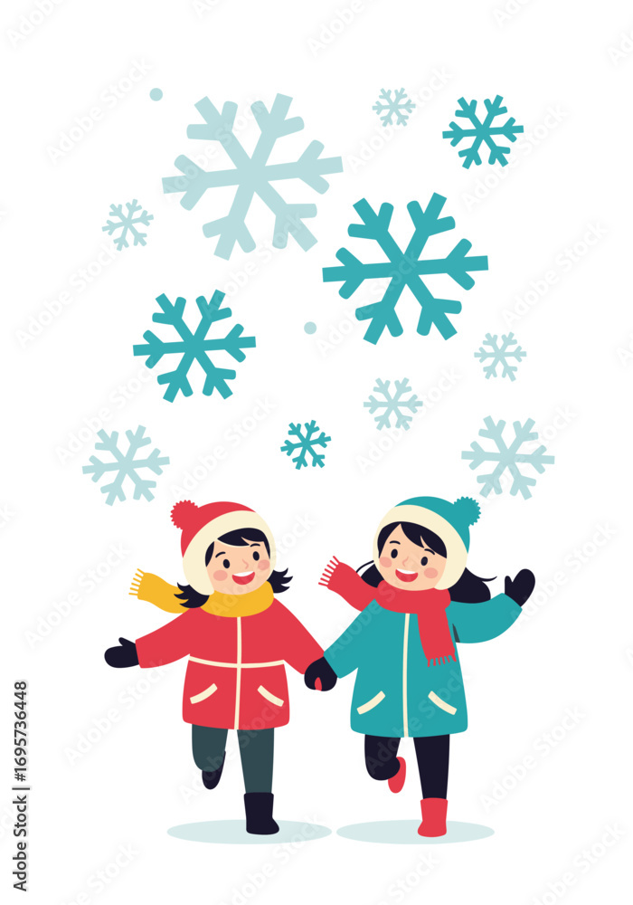 Fototapeta premium Two happy girls enjoying the winter snowfall outdoors together