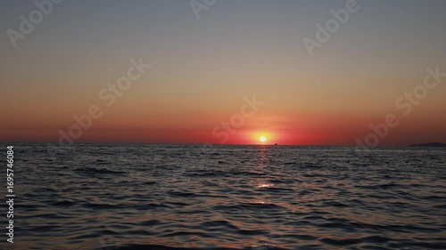 Abstract marine contrasting background with waves and pebbles.