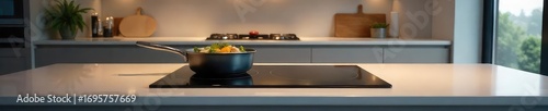 Modern Induction Cooker on Sleek Kitchen Countertop, Ready for Cooking; Clean Minimalist Design, Stainless Steel Appliance