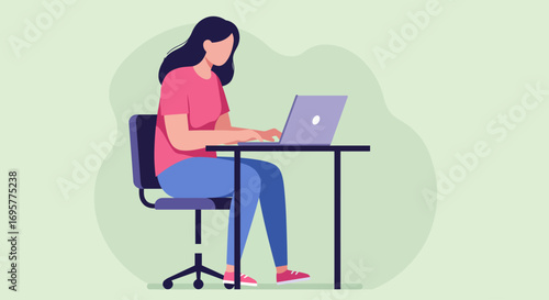 Woman working on laptop at desk, focused and productive in home office.
