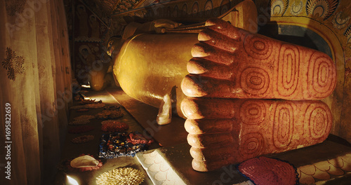Reclining Buddha with Beautifully Carved Feet on Display
