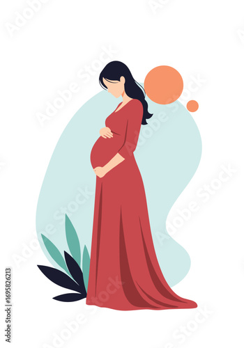 Beautiful expectant mother holding her belly in a flowing red maternity dress embracing new life
