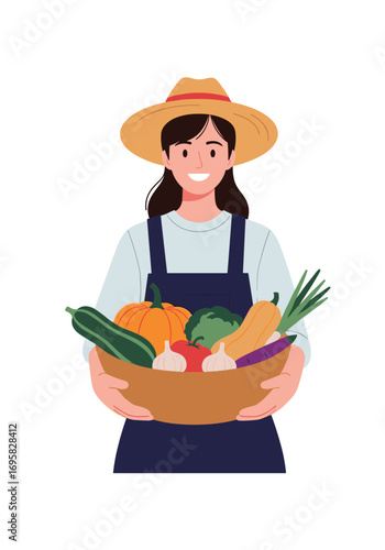 A happy farmer woman wearing a straw hat holds a basket full of fresh organic vegetables