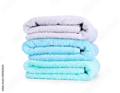 Stack of colorful terry towels isolated on white
