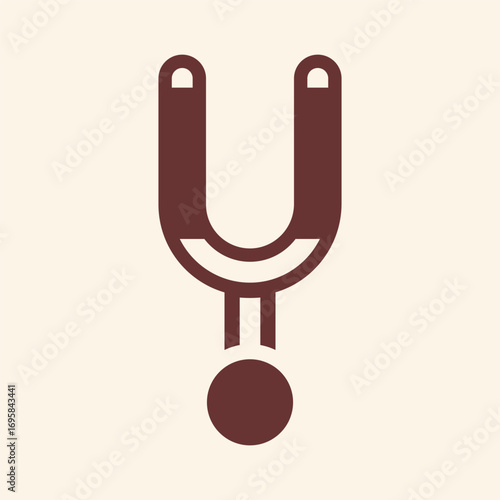 Modern horseshoe magnet attracting a small metal ball in a simple, clean graphic design