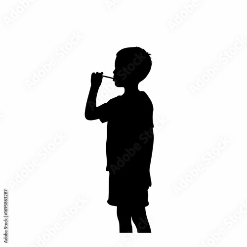 Silhouette of a boy brushing teeth for dental hygiene awareness