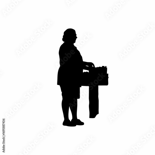 Silhouette of a person buying groceries at a market stall