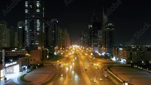 City lights flowing through Dubai at night