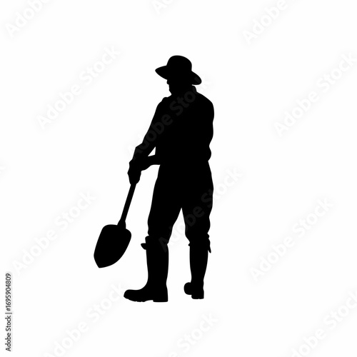 Silhouette of a farmer tending to organic compost for environmental awareness