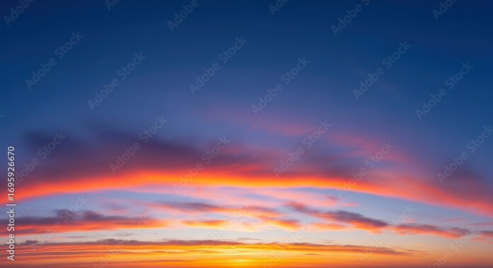 Fototapeta premium Dramatic Sunset Sky with Fiery Clouds