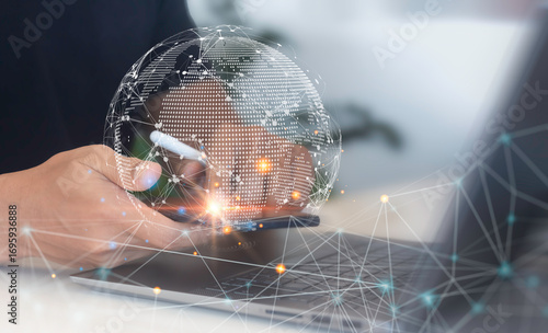 A person using mobile phone and laptop computer with  innovative technology background. Digital technology, internet network connection, big data, digital marketing IoT internet of things concept.