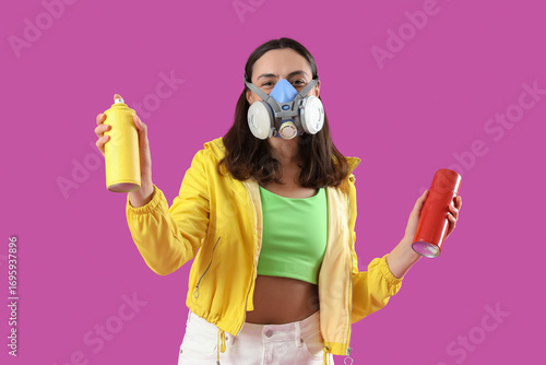 Young woman in respirator w...