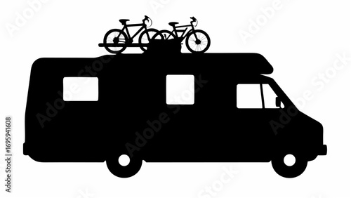 Silhouette of a camper van with two bicycles mounted on top ready for a road trip adventure in black and white