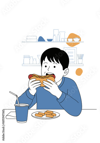 Youngster happily devouring a delicious hot dog with a refreshing drink nearby