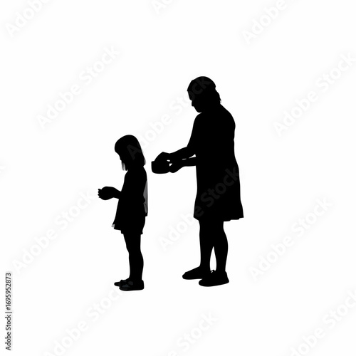 Mother teaching daughter healthy food preparation and hygiene