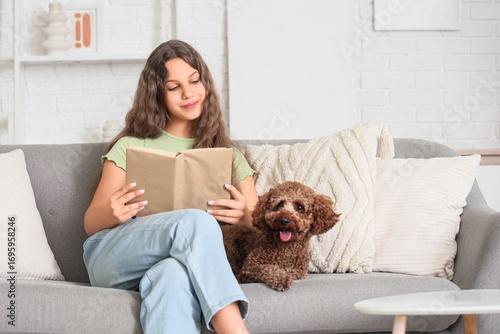 Teenage girl with Poodle do...