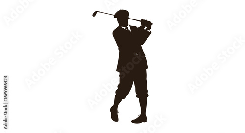 a golfer in silhouette swinging club on course