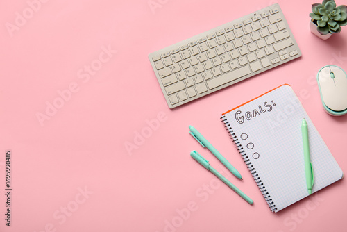 Notebook with text GOALS an...