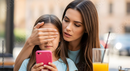 Mother protecting daughter from excessive phone screen time worried concerned parent child safety wellbeing digital detox family technology overuse online
