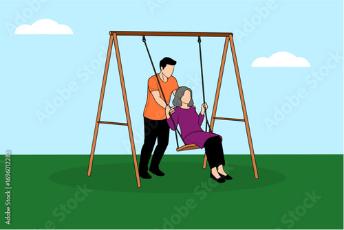 Happy family enjoying a sunny day swinging outdoors together on a swing set