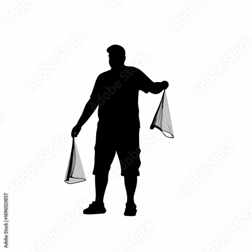 Silhouette of volunteer distributing mosquito nets for malaria prevention