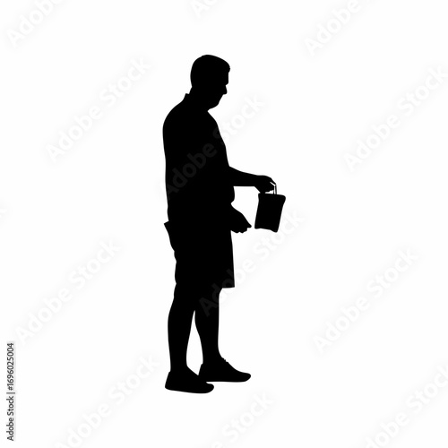 Silhouette of a voter casting a ballot in an election