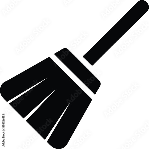A Simple Black Silhouette Vector Image of a Traditional Broom Showing its Bristles and Handle Pointing Upwards Diagonally to the Right