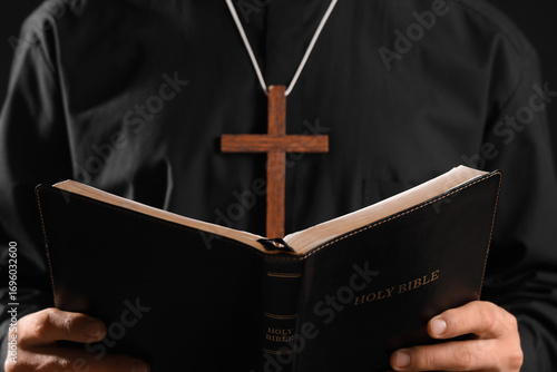 Religious leader reading ho...