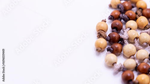 wooden bead balls strung together with string
