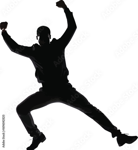 Silhouette of a Man Jumping in Dynamic Action PoseSilhouette of a Man Jumping in Dynamic Action Pose