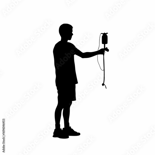 Silhouette of a young man donating blood at a camp for awareness