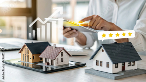 Real estate investment growth, housing market analysis, property investment with rising chart, business using tablet for real estate fintech, miniature house models on digital platform