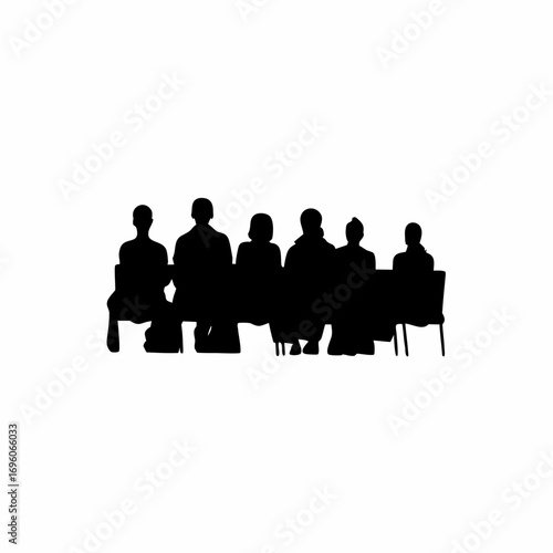 Silhouette of people watching a play in an outdoor theater