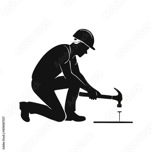 Plumber kneeling with wrench