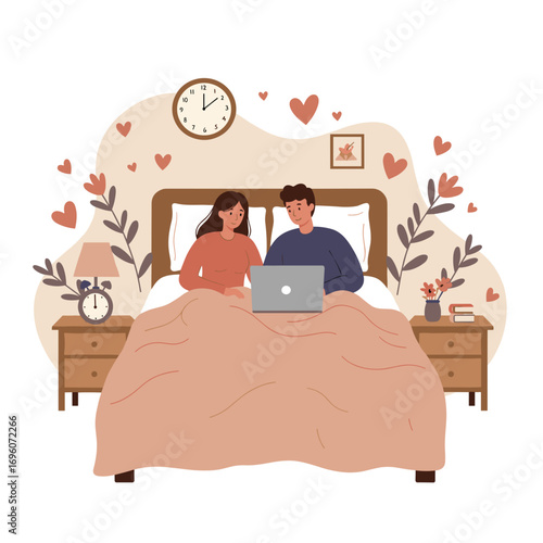 Couple enjoying time together in bed using laptop, concept of New Year 2026  