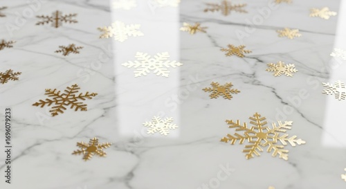 Gold snowflakes scattered on a marble surface