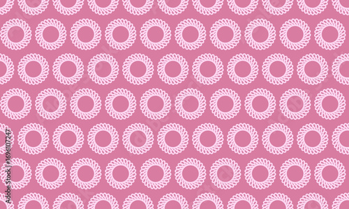 Elegant pink and white repeating circular pattern.  Perfect for textile design, wallpaper, website backgrounds, or feminine branding.