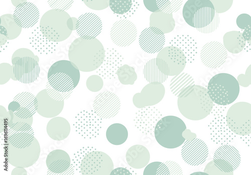 Abstract pattern of soft green and mint circles and dots with subtle textures and transparency effects
