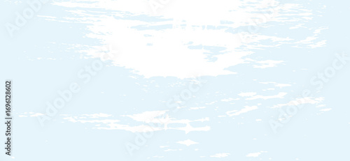 An image of a bright, pale blue sky filled with soft, wispy white clouds scattered across the frame.