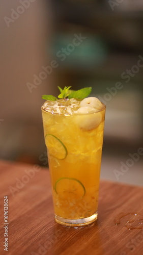 Wallpaper Mural Lychee aloe vera tea garnished with mint leaves, and fresh lychee fruit Torontodigital.ca