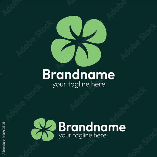 Four-leaf clover logo with a leaf and star symbol, a vector design combining nature and good luck in a simple style