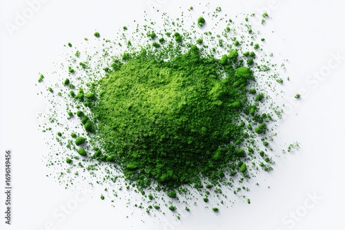 Green powder scattered on white (1)