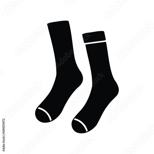 A pair of black socks with white stripes on a white background