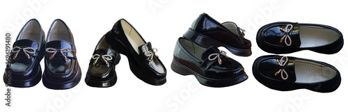 Shiny black girls' shoes stand on a white background