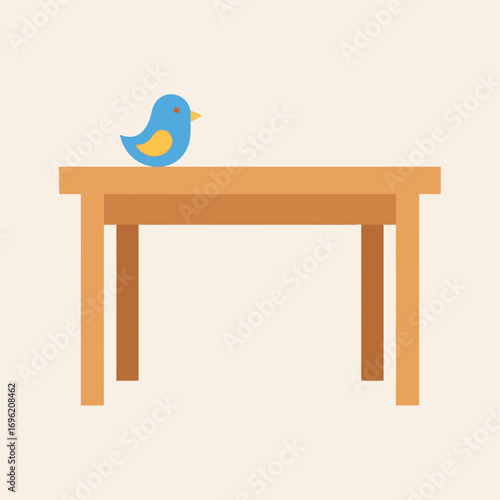 Blue bird figurine sits on a simple wooden table against a neutral background.