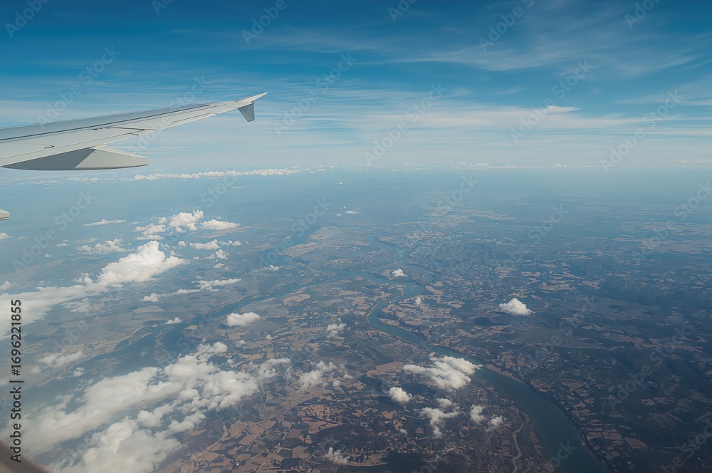 Naklejka premium View of terrain from an airplane window
