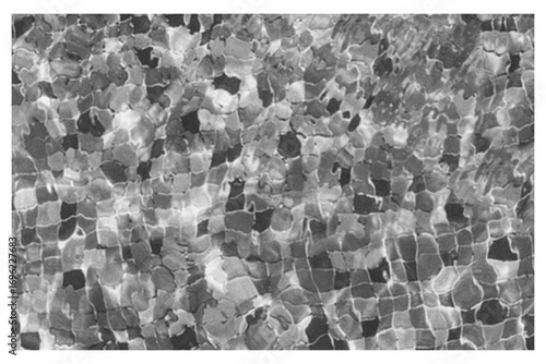 Abstract Stone Surface with Water Reflection Creating a Distorted Pattern