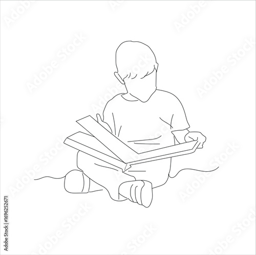 boy reading a book. Boy studying with reading book.